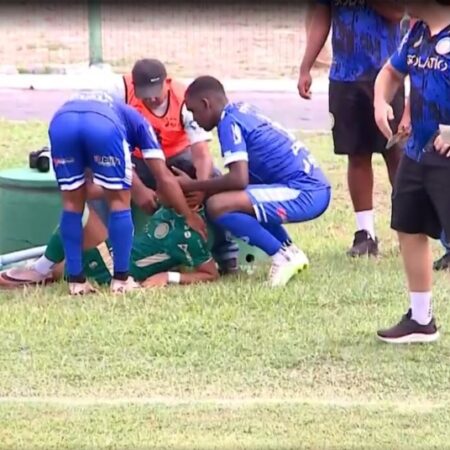 Brazilian Footballer Suffers Head Injury in Pitch-Side Collision